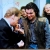 Janko Martinkovic lights a cigarette for President Havel