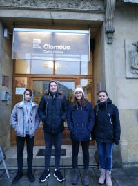 Pupil team in front of the radio