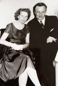 With her husband at a dancing ball in 1963