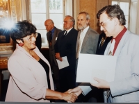 Věra Perlínová accepts the Jan Amos Comenius Medal from the Eduard Zeman, the minister of education 