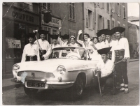 Accompanying a beauty queen. VSACAN (folklore ensemble of Wallachian songs and dances from Vsetín) in France, Miroslav Ekart third from the left, turn of 1950s and early 60s 