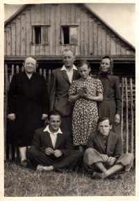 Jan Sedláček (bottom left) with his parents, siblings and aunt / 1950s