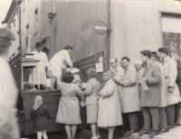 Grandpa Augustýn giving out sausages, May Day, beginning of the 70s 