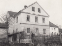 Mother Kristýna Nevšímalová in the window of the parish building in the village Pěkná, 1972