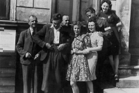 The staff of the first revolutionary national committee in Smržovka after World War II, thanks to her knowledge of German and administration, included Marie Valešová. She is in the striped dress pictured on the right with her friend Stanislava Patrmanová