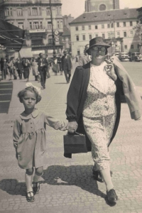 Stanislava Žabková with granny Čadilová at Národní třída Street near Jungmann Square in Prague. Around 1938