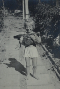 Anna Vyoralová in the yard in Káraný