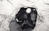 Miloslav Vítek (forefront) descending into a gold ore mine in the Jeseníky Mountains