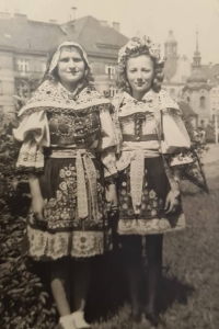 Stanislava Šťastná in the Kyjov region traditional dress, welcoming Soviet soldiers, right, May 1945