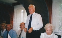 A pilot convention, his father standing, his mother siting next to him on the right, Brno, 2006 

