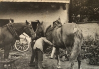 With Uncle Micka, the blacksmith at the Lány castle, where he shoed mares for President T. G. Masaryk
