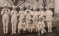 Irena Mrkvičková (bottom centre) during a school performance