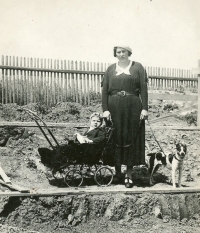 Three-year-old Zdenka Pospíšilová with her mother Marie Vyskočilová in the garden of their house just after its construction, 14 June 1936