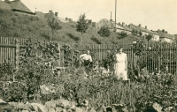 The Vyskočil family rented a garden on Palackého Street in Opava, with a railway embankment above them, 1930s