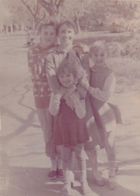 Oksana Novikova with her mother and sisters, early 1990s