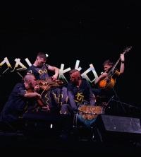 Yaroslav at a charity concert as a member of the Joryj Kłoc music band. Zamość, Poland, 2022