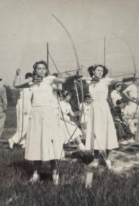 Eugenie Kubalíková (right) in archery practice