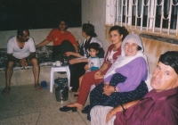 Family photo. From right: brother, sister, sister-in-law, nephew, sister, mother and brother-in-law, Suwayda, 2004