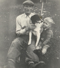 Josef Tkáč as a child with his grandfather Demeter Tkáč in Slovakia, 1950s