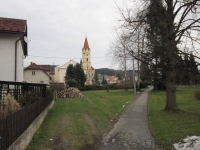 The church in Dolní Bečva with the Hynek Tošenovský Avenue