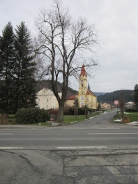 Church in Dolní Bečva with a monument to Hynek Tošenovský