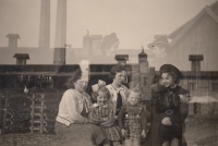 Double exposure photo taken on April 14, 1940 on Rosemarie Bensch's 6th birthday, aunt and cousin, brickyard in background