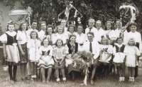 Harvest Home festival in Hradec nad Svitavou. Grandparents Bedřiška Ondráčková and Ladislav Ondráček in front with a wreath, Richard Borovský's mother Bedřiška Ondráčková is left of them, 1947