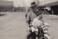 The witness with his father and younger sister Věra on a motorbike