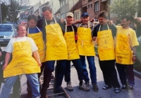 Jan Tomeček visiting his native Moravia during the traditional pig slaughter, third from the right