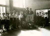 Pioneer members stand guard of honour in the school entrance hall at the busts of Stalin and Gottwald after their deaths in March 1953