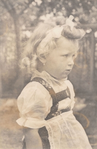 Ludmila Cibulková during the war in the street near the family house in Košutka