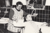 Milena Tejklová at work in a barbershop, Červená Voda, 1972