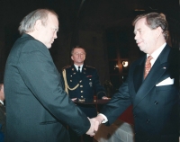 Jan Vrba receives the Medal for Heroism from Václav Havel on behalf of his father, 1997