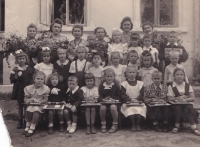 First grade. Adel is standing in the center of the second row. School No. 27, Lviv