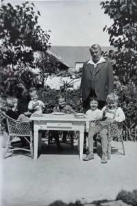 Grandfather and grandmother Udržal with grandchildren