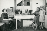 Family photo from the celebration of the father's 50th birthday. Bohumil Šihora with his wife Anežka and their daughters Antonie (left) and Eva (right) in the 1950s