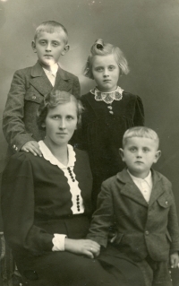 Gamekeeper Ferdinand Büfel's family - wife, son Ferdi, daughters Hermína and Helda and the youngest son Herbert; circa 1940