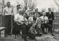 Antonie Tichopádová and Luboš Tichopád's wedding photo. Antonie Tichopádová is sitting in the middle with the accordion; 1956