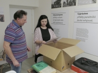 Jiří Podlipný with documentary filmmaker Jarmila Vandová Flakova while viewing his archival materials in the Pilsen recording studio, 2024