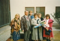 Jaroslava Hoťová with her family after her graduation - from left: daughter, husband, son, mother, Karolinum, Prague, 1998