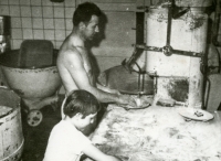 Arnošt Obrusník with his daughter Karla in the bakery in Vrbno pod Pradědem in 1975