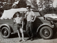 A witness in front of a German military car, which he repaired himself, with his son Jiří