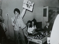 DJ Zdeněk Raboch holding a copy of the New Musical Express, the most prestigious European music magazine that his aunt in America subscribed to in England and sent him every week