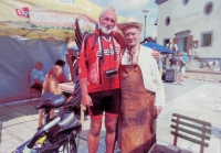 At the market in Volary with his pupil, who sends him a special rubber disc with diamond dust every year for cutting jewellery