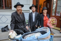 Zvi-Hirsh Blinder's family at the ceremony of circumcision of his younger son. Odesa, the Chabad synagogue, 2013