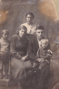 Grandmother Lida and grandfather Mykola, sitting, 1941