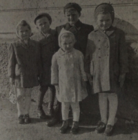 Jan Chloupek in his childhood with his sisters and cousins