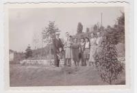 In days of Sokol festival (1938) - from left MUDr. F. Reinl, Ing. F. Reinl, Milena Reinlová (Hradečná), Božena Hradečná, JUDr. Vladimír Hradečný, Jaroslava Hradečná, Jiřina Petřková, Marie Reinlová, small witness Jiřina with grandfather. Podolí in garden