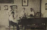 Father with his brothers playing music together