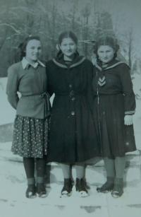 Girls in traditional uniforms for Greek children in orphanages in Poland